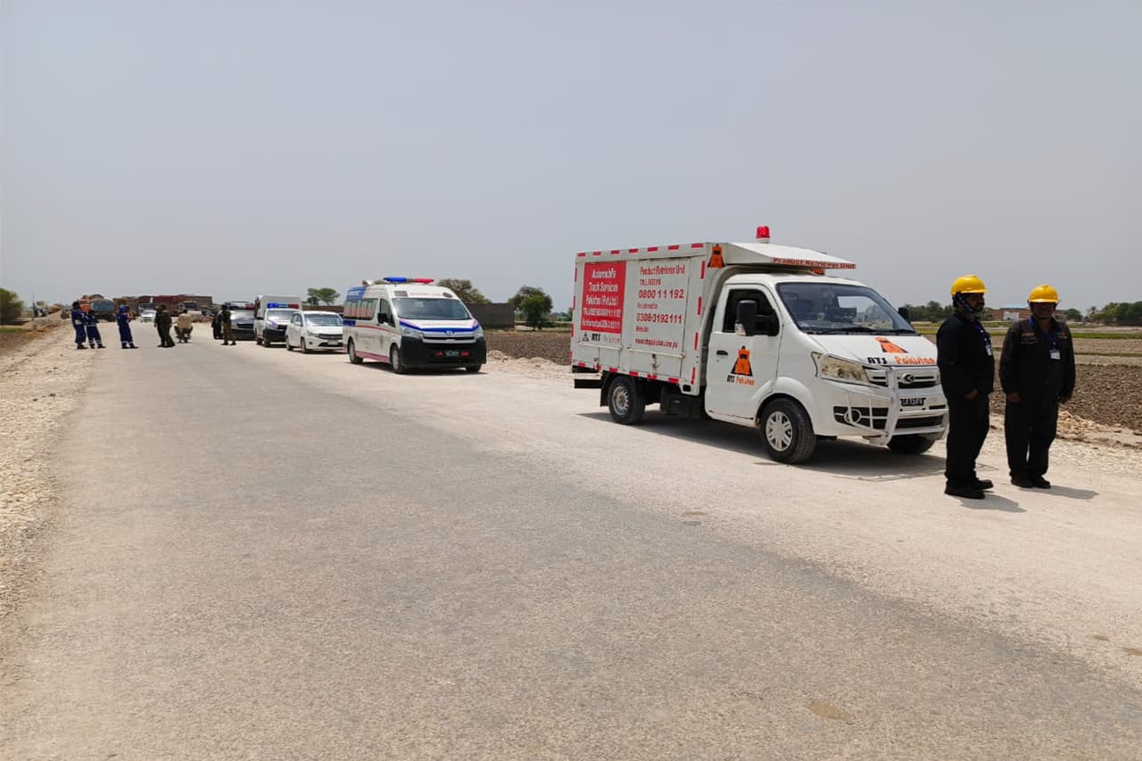 ATS Humsafar recovery crew and branded van on site, coordinating with emergency services
